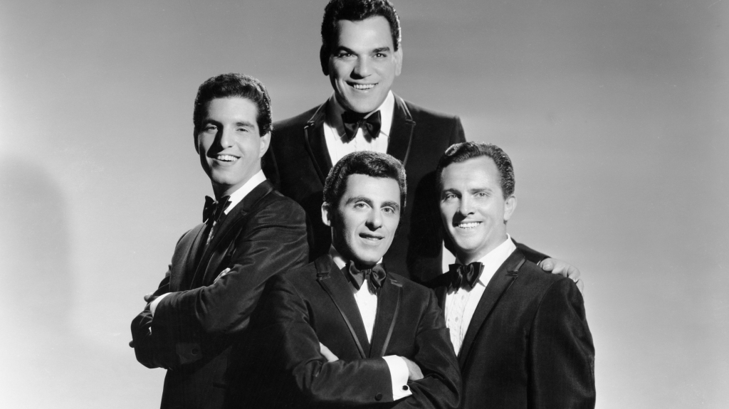 The Four Seasons pose for a portrait circa 1963 in New York City. They are, clockwise from the top, Nick Massi, Tommy DeVito, Frankie Valli and Bob Gaudio.